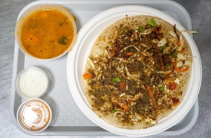 Fresh uttapam with vegetables at Balaji Dosa Live Edmonton